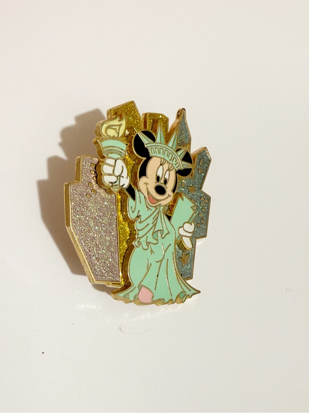 Small Disney pin of Mickey as Statue of Liberty